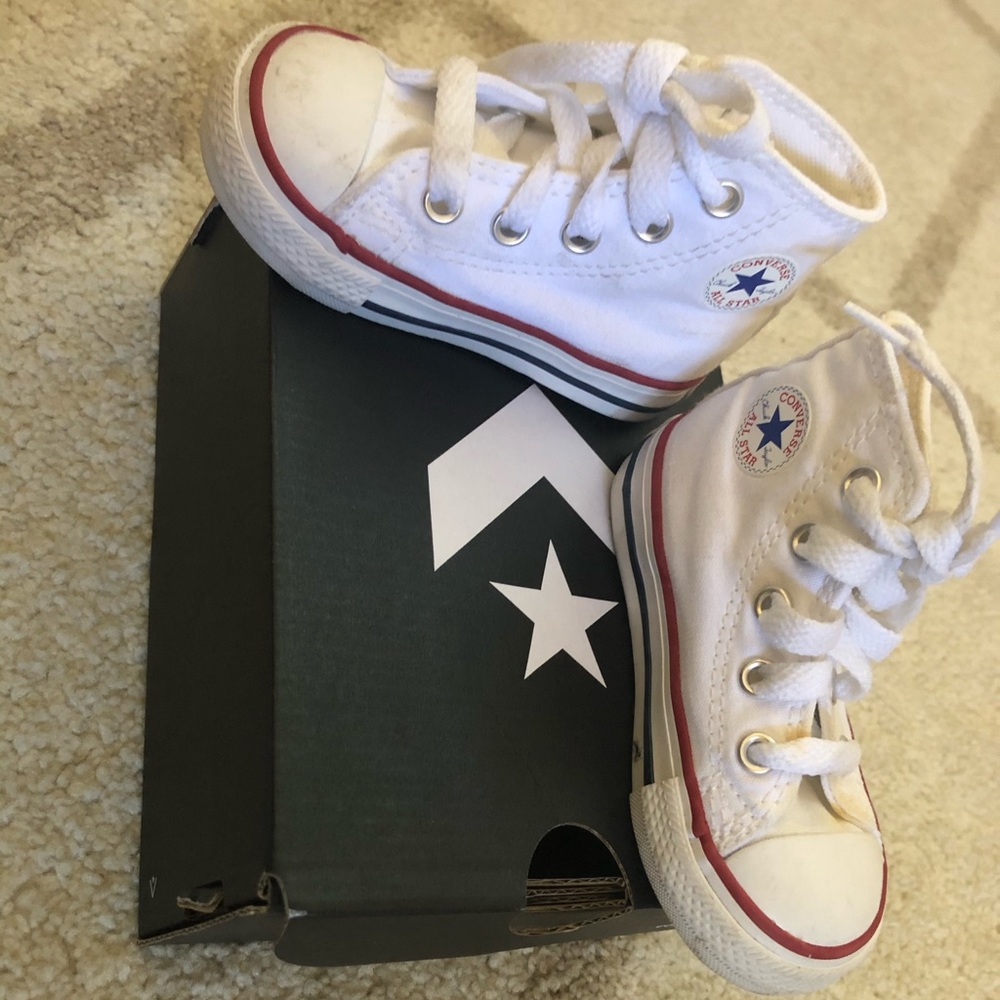 White high-rise converse.